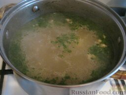 Суп Харчо из говядины: Через 20 минут положить половину зелени, аджику, соль и перец.
