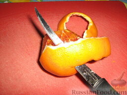 Салат с апельсином и крабовыми палочками: Апельсин очистить 