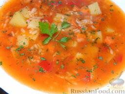 Томатный суп с рисом: В конце добавить в томатный суп с рисом рубленую зелень.  Приятного аппетита!