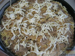 Запеканка из макарон, сыра и куриной печени: Посыпать сверху запеканку панировочными сухарями и покрыть тертым сливочным маслом.
