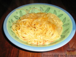 Спагетти с боттаргой: Распределяем по тарелкм и посыпаем сверху оставшейся боттаргой. Приятного аппетита!