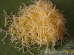Яйца-грибочки: Твердый сыр натереть на мелкой терке.