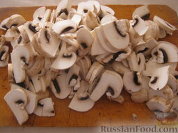 Тушеная капуста с грибами (в мультиварке): Как приготовить капусту тушеную с грибами в мультиварке:    Вымыть и нарезать шампиньоны.