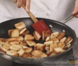 Страта с крутонами, шпинатом и фетой: Как приготовить омлет в духовке или страту:    1. Решетку установить в духовке на среднем уровне, а саму духовку включить для предварительного разогрева до 200 градусов.  2. В миске взбить яйца с молоком, половиной сыра, 1/4 чайной ложки соли и таким же количеством перца.  3. В большой сковороде с жароустойчивой или съемной ручкой разогреть 2 столовые ложки сливочного масла на среднем огне. Высыпать в разогретую сковороду лук и жарить, помешивая, около 3 минут. Ввести в сковороду шпинат, посыпать 1/4 чайной ложки соли и готовить до увядания, около 2 минут. Переложить содержимое сковороды в отдельную миску.  3. В той же сковороде разогреть еще 2 столовые ложки масла, выложить кубики хлеба и готовить на средне-сильном огне, помешивая, до золотистого цвета, около 5 минут. Погасить под сковородой огонь.
