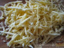 Салат с тунцом и гранатом: Твердый сыр натереть на крупной терке.