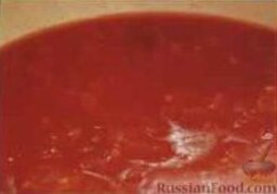 Томатный суп-пюре с фрикадельками: Как приготовить томатный суп-пюре с фрикадельками:    1. В большую кастрюлю положить половинки помидоров, готовить на средне-слабом огне, помешивая, до мягкого состояния помидоров, примерно 10 минут.    2. Протереть помидоры через металлическое сито. Перелить пюре в чистую кастрюлю, готовить на среднем огне, помешивая, до остаточного объема массы 1 л. Снять кастрюлю с плиты, отставить в сторону.