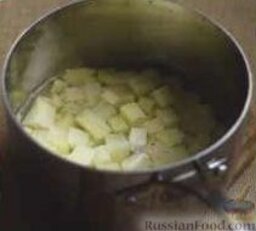Гарнир из нута и картофеля: 1. Нут сложить в большую миску.    2. Картофель сложить в большую кастрюлю, залить водой, варить 10-12 минут. Затем осушить.    3. В небольшой миске развести тамариндовую пасту в 0,5 стакана воды.     4. В тамариновую воду добавить порошок чили, сахар и 1 ч. ложку соли. Залить этой пряной смесью нут.
