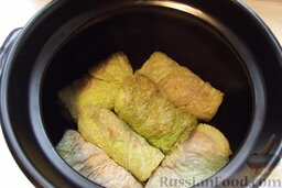 Голубцы из савойской капусты (с куриным фаршем и грибами): Голубцы укладывайте слоями в посуду, в которой они будут вариться (желательно подходящую для духовки).