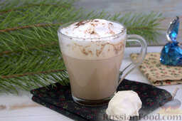 Пряный рождественский кофе: Посыпаем рождественский кофе порошком какао, подаем незамедлительно.