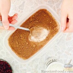 Шоколадный манный пирог с брусникой: Добавить соду, сверху погасить уксусом. Добавить какао, перемешать.