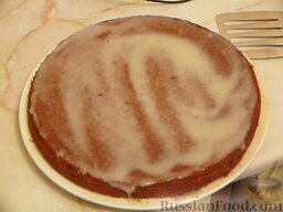 Шоколадный пирог с какао, яблоками и ванильным кремом: Пока выпекался пирог я приготовила ванильный крем согласно инструкции на упаковке и остудила его. Готовый пирог смазать кремом.