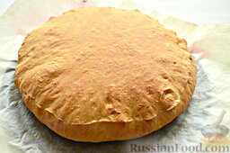 Пирог с квашеной капустой и зеленью: Пирог с квашеной капустой выпекаем в разогретой духовке примерно 30 минут при температуре 180°С.