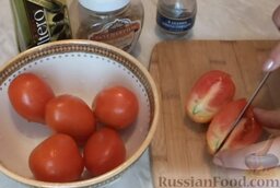 Вяленые помидоры (в микроволновой печи): Как приготовить вяленые помидоры (в микроволновой печи):    Разрезать помидоры на 4 части.