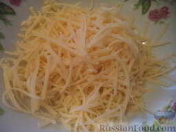 Крабовые палочки в кляре "Шустрые": Сделать кляр. Для этого натереть на мелкой терке сыр.