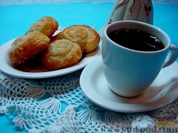 Сахарное печенье "Ушки" из слоеного теста: Сахарное печенье из слоеного теста готово. Осталось лишь заварить крепкий кофе и позвать своих домочадцев к завтраку.