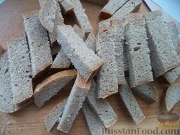 Гренки с чесноком: Как приготовить гренки с чесноком:    Хлеб нарезать небольшими ломтиками.