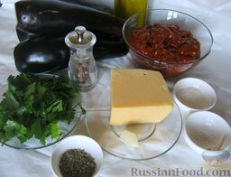 Баклажаны в духовке по-гречески: Баклажаны, сыр, томатный соус,орегано, чеснок, масло, соль, сахар и черный перец – все что нужно для приготовления этого вкусного и простого блюда.